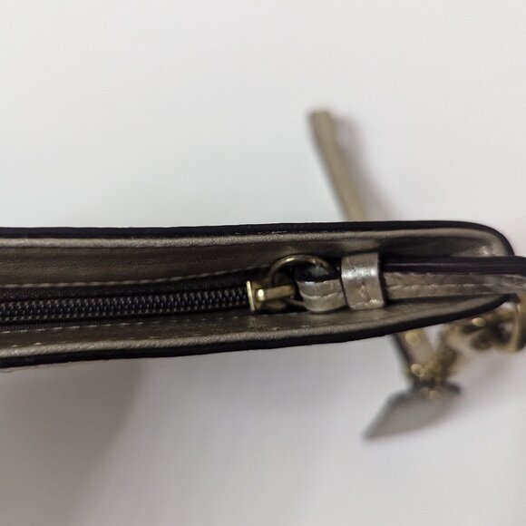 Like new Coach Metallic Champagne Gold Wristlet Clutch - Picture 7 of 16